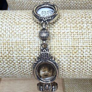 Brighton Silver-Tone Memory Locket Charm Bracelet With Baby Motif & Heart Clasp